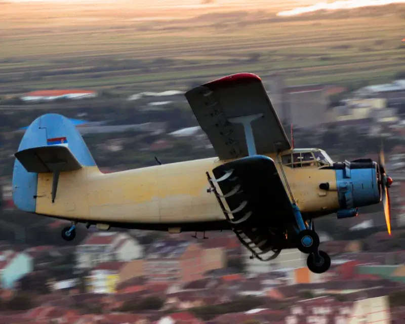 Aerial pesticide spraying of towns