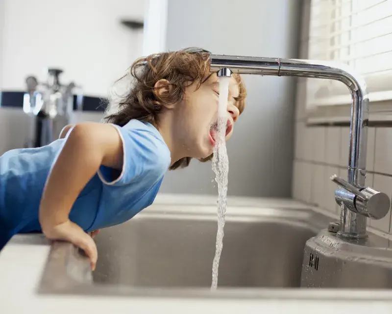 Boy drinking water